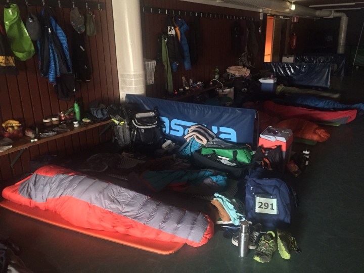 Airbeds on the floor of a gym